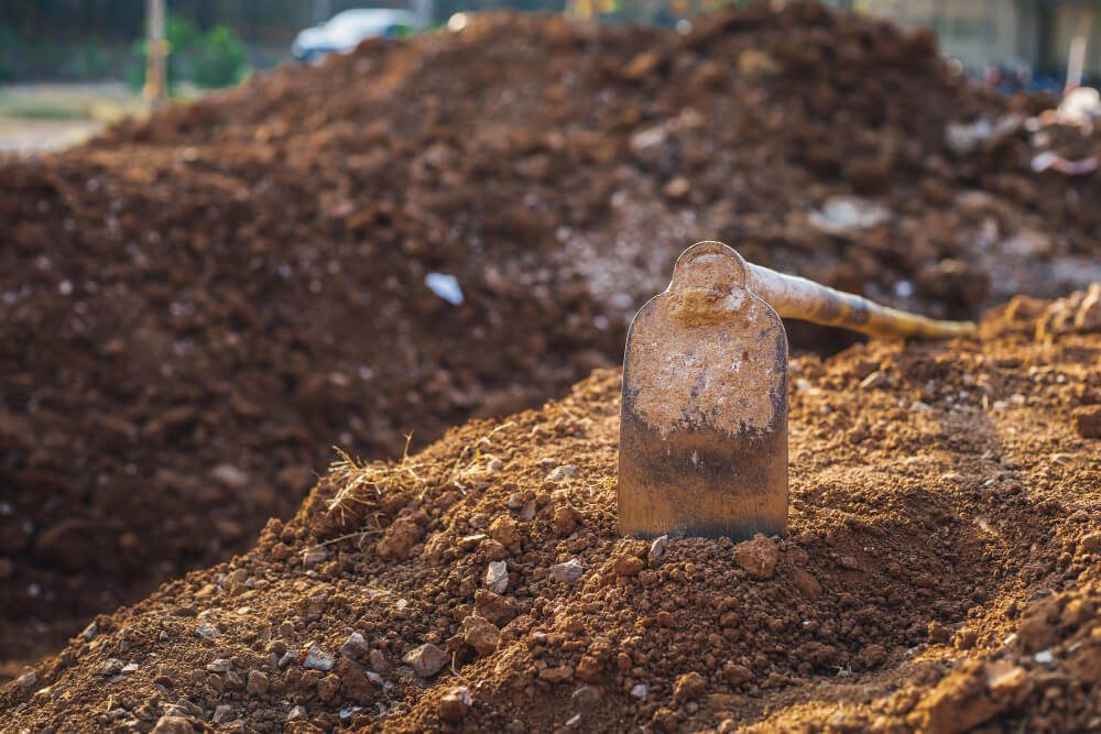 Grab lorry clearing waste from a Midlands site