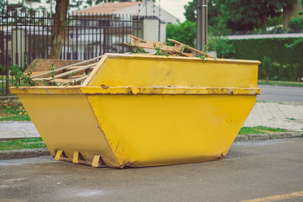 Skip filled with waste on a Midlands construction site