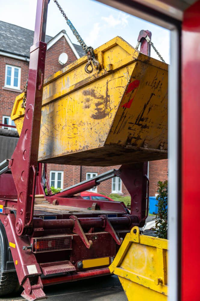 Skip loaded onto a lorry for collection in the Midlands