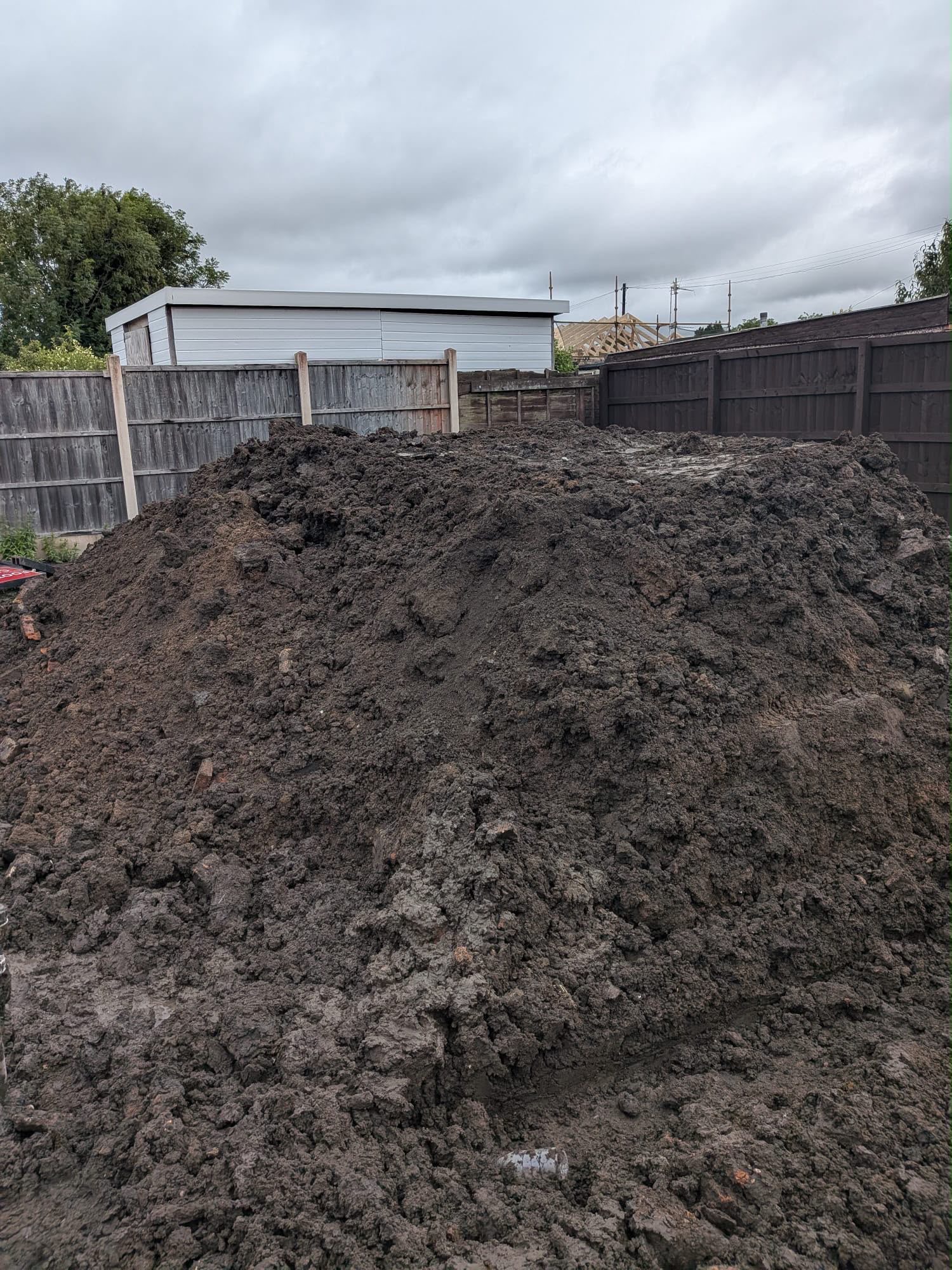 Excavated soil on a construction site awaiting classification and WAC testing before muck away