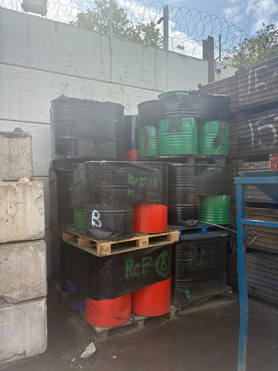 RCF waste double bagged and sealed into drums for consigned disposal